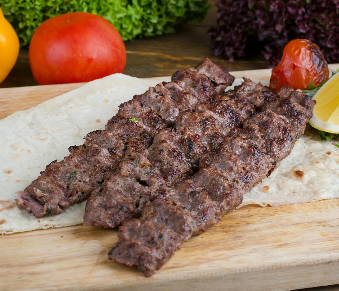 How to make Beef tomato & olive kebabs